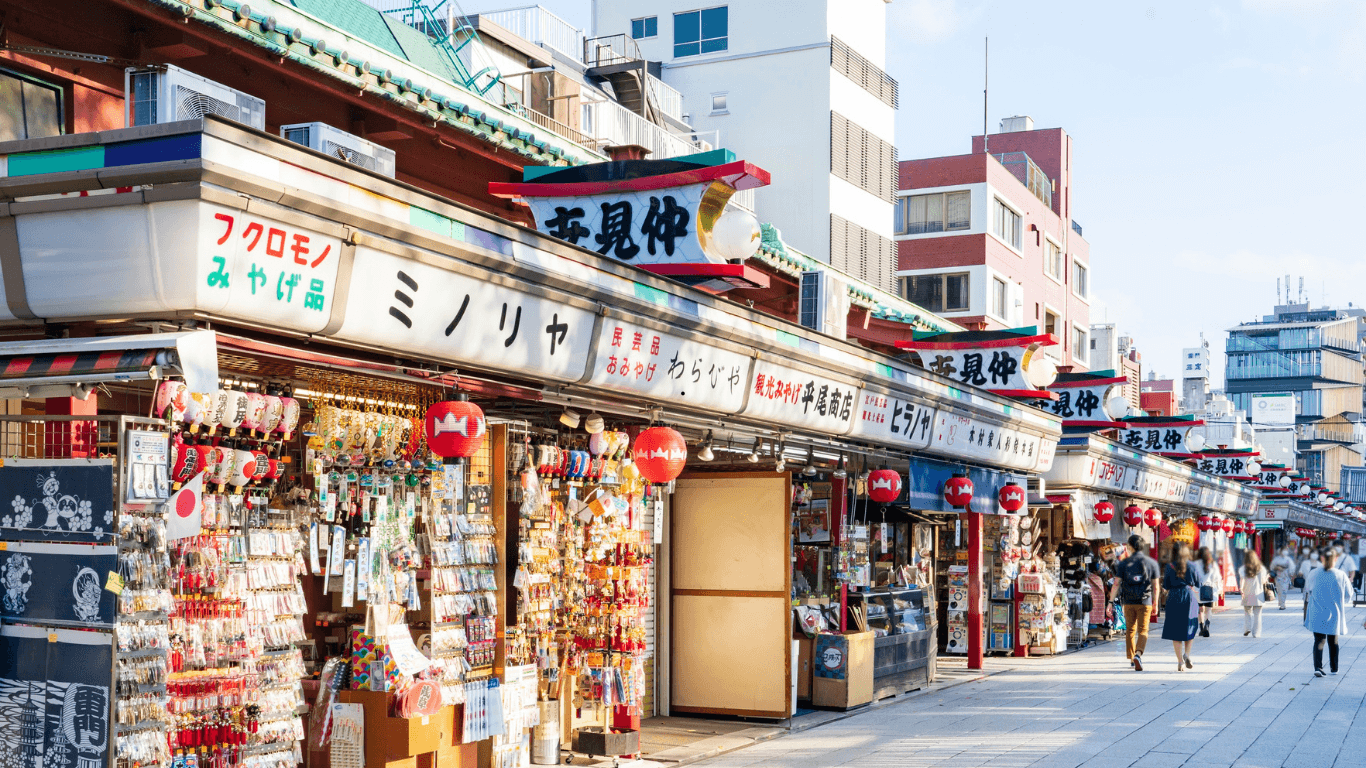 Traditional Japanese shopping street with local souvenir shops and lanterns